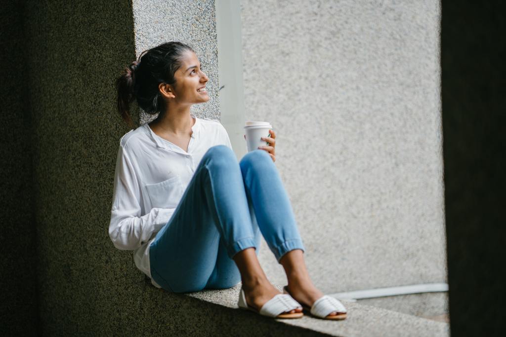 A woman looking out from a window